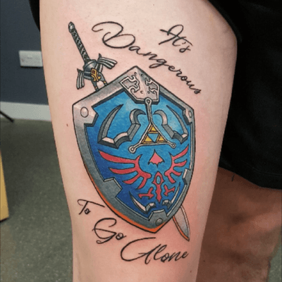 (*Note* The sword is genuinely straight, the wrapping around the leg just makes it look completely off in the photo) #nintendo #gamertattoo #zelda #newschool #legendofzelda #HylianShield 