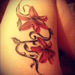 #tattoo #lillies #red #leg #thightattoo #realistic #flower 
