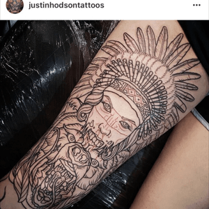 Bear wearing an Indian girl as a headress on the back of the thigh, one for the animal kingdom, done by Justin Hodson at Fat Ink Tattoo in Newcastle, Australia. 