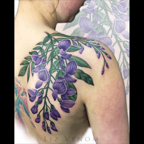 Wisteria tattoo by Liz Venom #wisteria #shoulder #nature #botanical #realism #female #floral #flowers #girly #feminine #ladytattooers #vintage #classical #color #colour #best #beautiful #flattering #amazing 