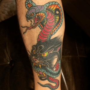 Tattoo by Marc Nava #pantherhead #snake #panthertattoo #tradional #bold #snaketattoo 
