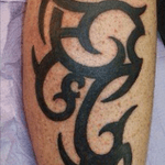 My first tattoo. I designed this, my kids initials are hidden in the design in the order of their birth. 
