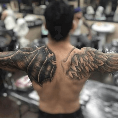 angel vs devil shoulder tattoo