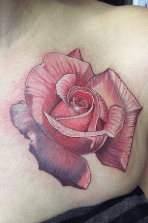 Pink rose, front of shoulder.