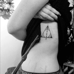 My first tattoo ! Deathly hallows 