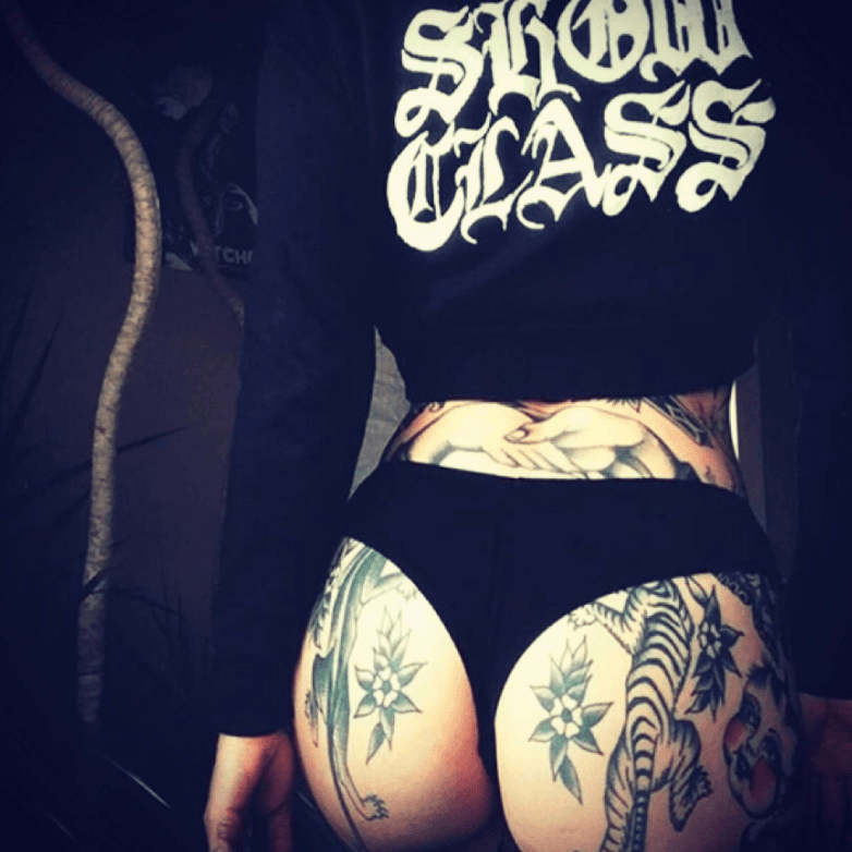 Tattooed girl and her sexy ass