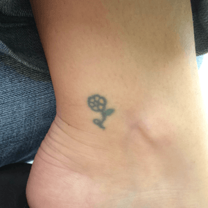 My first tatoo at age 18 in 1993. My daisy