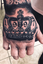 90’s baby crown hand tattoo by Ruben barba at Authentic roots in Long Beach,Ca #handtattoo #crowntattoo #crown #1997 