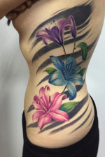 Tattoo by #mayamunny @maya_munny #lillies #flowers #black #color 