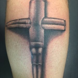 Tattoo uploaded by Zachary Balint • #blackandgrey #cross #50cal #religous •  Tattoodo