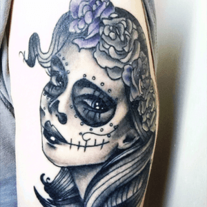 A Day of the Dead girl tattoo. Probably one of my more meaningful tattoos. This one has a long story behind it about a really good time in my life. 