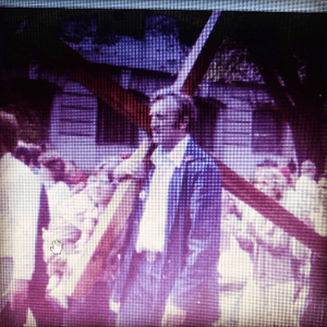 This is my dad carrying a cross (yup just like jesus)though inthought he was crazy when i was a kid i have to hive him credit for always sticking to his guns and his faith. Now he is dying and i want to remember him this way with a tatt of this 