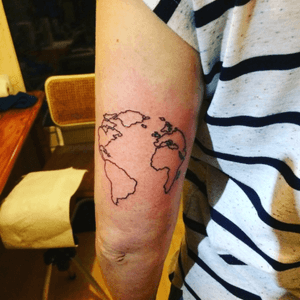 Small earth globe tattoo ..last night session