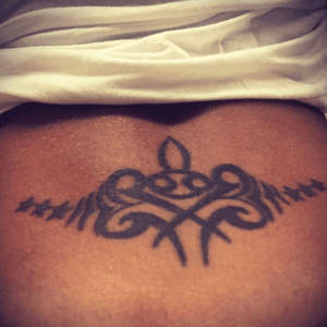 Cancer zodiac sign w/tribal. I'm wanting to get this covered up. 