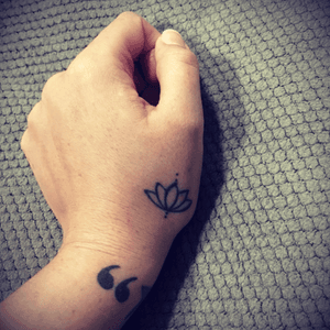  #lotus #flower and one half of a set of #quotation #marks #quote #hand #tattoo #line #drawing #simple