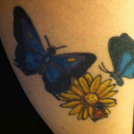 My frist one. The flower and ladybug are fir my daughter and the two butterflies are in memory of two different life changes events. 