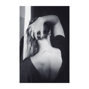 Backless ▪️ #feather #infinity #tattooaddict 