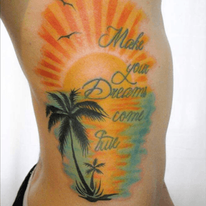 My new tattoo.  #sunshadowstattoo #sun #palmtree #sea #water #birds #tattoo #sidetattoo 