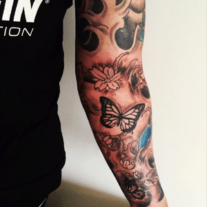 Finishing my sleeve. More colour and waves to touch up #butterfly #lotus #sleeve 