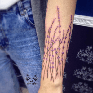 This is different. Cute #flowers #vines #purple #forearmtattoo 