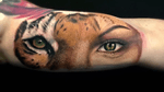 Tiger/female face tattoo (: #tiger #tigertattoo #color #eyes #art #artist #colorful #colorfulltattoo #beautiful #realism #realistic #tattoooftheday 
