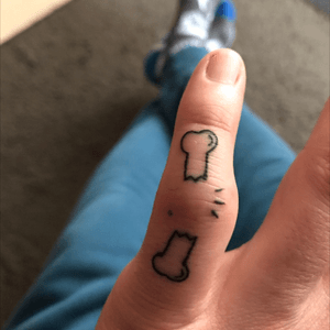 Broken finger tattoo