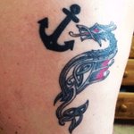 Dragon for my welsh heritage and celtic symbols for life death and rebirth, and infinity. 
