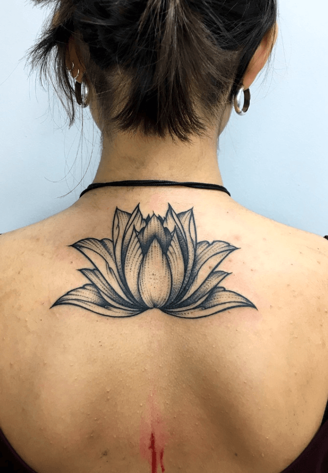 Lotus flower black and grey side girl tattoo by Jon von Glahn TattooNOW