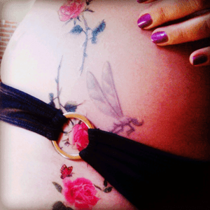 The dragonfly is real the rest temporary #dragonfly #temporary #roses #realandfake #hips #thigh 