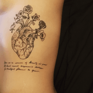 My tattoo, its a memorial tattoo. an anatomical heart with 6 flowers, each flower is a family members birth flower. The hand writing is my grandmother's, it says "there is a sense of beauty  in the pain. The heart must experience saddness in order for beautiful flowers to grow." By Jimmy Villegas #anatomicalhearttattoo #anatomicalheart #heart 