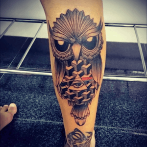 Geometric owl tattoo.