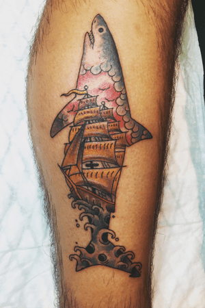 Ship inside of a shark on the outside of my right calf