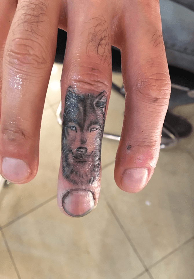 wolf tattoo on finger  Elephant finger tattoo Snake tattoo Finger tattoos