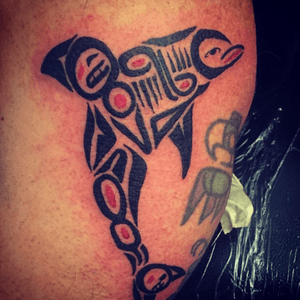 #haidatattoo #dolphin on my right shoulder. Part of my #haidasleeve by Anthony DeJesus. #shouldertattoo #blackandred 