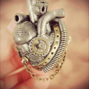 a steampunk heart is something I have been wanting to get tattooed on my chest for years now. This image is close to what i want. I want a perfect combination of flesh and mechanics to represent the balance of passion and sensibility I want and try to have in my life. I've seen the work you do and would be honored to have your work be apart of me. #megandreamtattoo