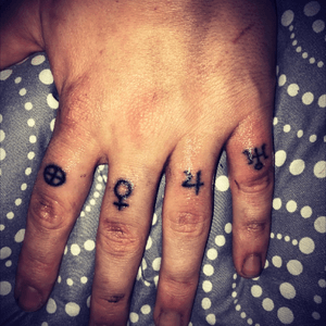 Planetary symbols on knuckles. First tattoo. Handpoke.