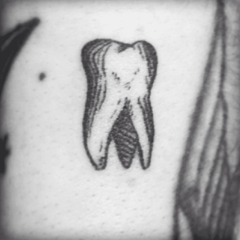 What Does Tooth Tattoo Mean  Represent Symbolism