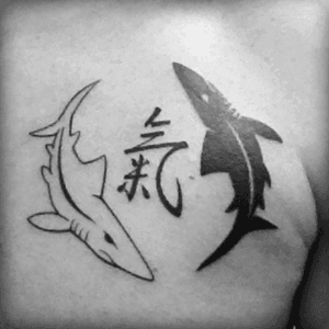 My first tattoo. Ying & Yang with sharks and the Qi symbol