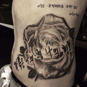 White rose and caligraphy done.  #blackandgay #realistictattoos