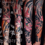 Japanese full sleeve. Goldfishes and Lotuses tattoo.