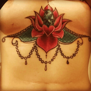 My underboob tattoo.. latest tattoo to get #underboob #sternum #lotus #gem #sexy #girlswithtattood