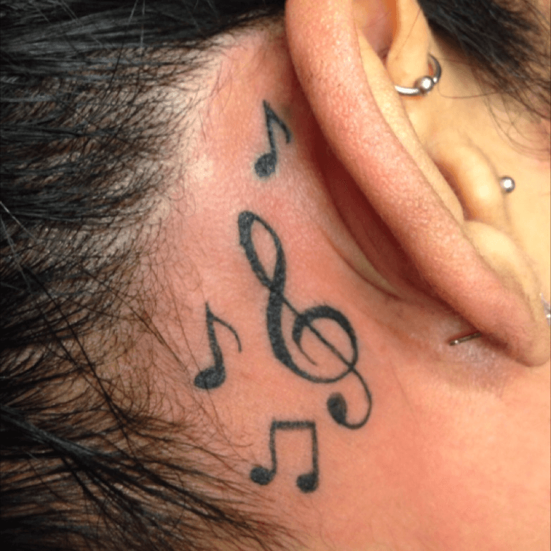 Music symbols behind the right ear