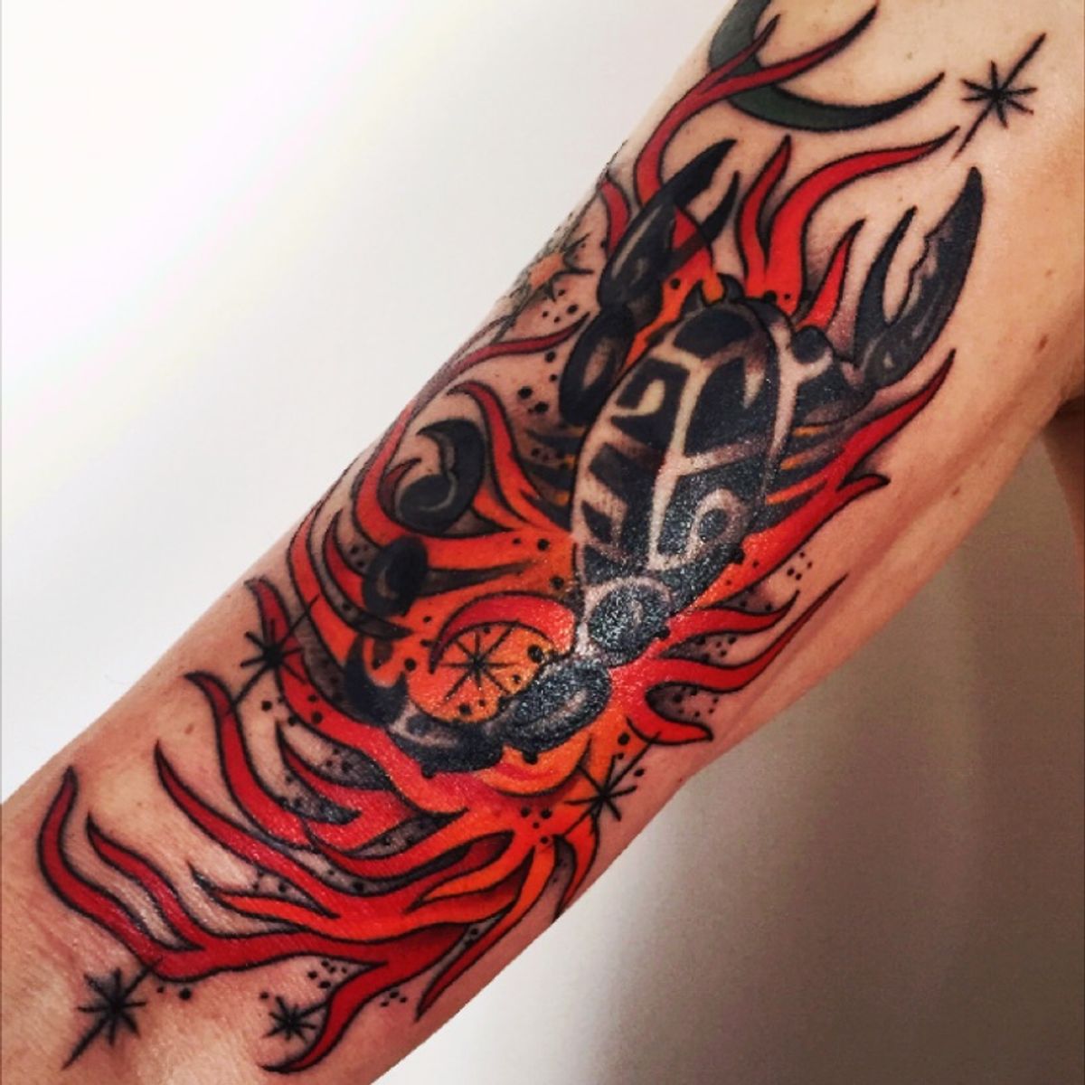 Tattoo uploaded by Marc • Scopio in the flames under the moon. Artist