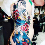 Artist unknown #peacock #feathers #roses #flowers #sidetattoo 