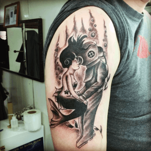 My husband's tattoo, he is a diver.