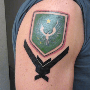 Spartan Insignia and Noblem Team Emblem from Halo. Pair-A-Dice Tattoo in 29 Palms California. Artist Shawn Hosel.