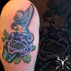 Coverup piece, covering some old magic mushrooms with a blue sky background, done by DannyScottTattooArtist