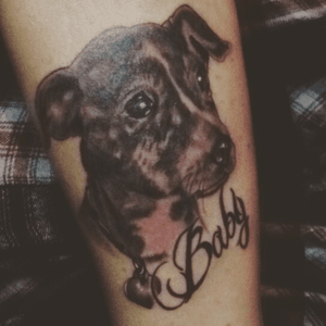 I got this tattoo in memory of ny childhood dog who just recently passed away...i miss her so much! 