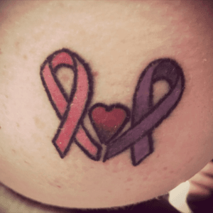 Double awareness ribbon: pink for breast cancer, purple for pancreatic cancer. My mom was a 28 year breast cancer survivor before dying from pancreatic cancer. This tattoo is on top my shoulder where she has to look down on it daily. She hated my tattoos. Done by Taura Rene Parker #ribbon #ribbontattoo #awareness #breastcancer #cancer #cancerawareness #cancerawarenesstattoo #heart #hearttattoo 