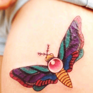 This is my #secondtattoo and it is a verry #colourfulltattoo. It is a #oldschool moth. It looks like it had a weird structure on de right wing but that is the bad lighing. #moth 